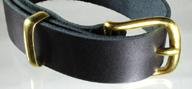 A brass plated dress buckle in use.